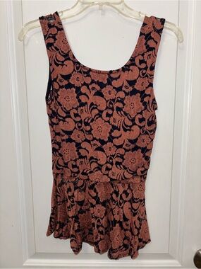 Sleeveless Floral Peplum Top in Black and Rust